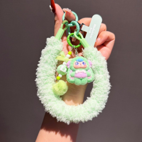 Lanière poignet vert poupée pompon | Smarty