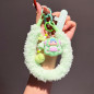 Lanière téléphone poignet ECO – Moelleuse vert porte-clés poupée et pompon